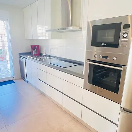 Apartment Punta Prima Indoor & Outdoor Pool